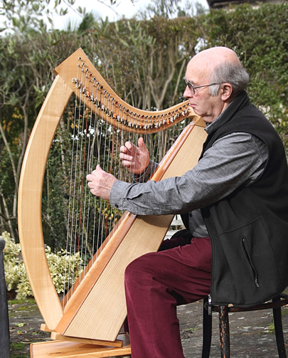 Photo of Charles Hope with harp